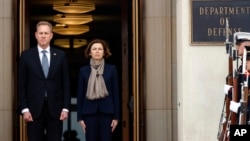 Acting Defense Secretary Patrick Shanahan and French Defense Minister Florence Parly stand together during an arrival ceremony at the Pentagon, March 18, 2019. 