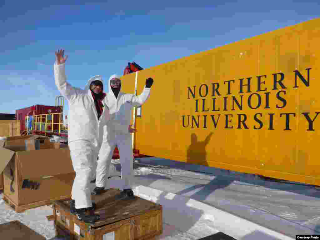 Tractors pulled equipment and supplies 1,000 km from McMurdo station to the field site, where NIU geology professor Reed Scherer (left) and graduate student Jason Coenen welcome the start of the project. (NIU)