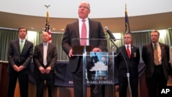 FILE - John Strong, FBI special agent in charge of North Carolina, addresses a press conference at the Wake Forest Town Hall, April 10, 2014. On Monday, Nov, 29, 2016, Strong said: "Justin Sullivan planned to kill hundreds of innocent people. He pledged his support to [Islamic State] and took calculated steps to commit a murderous rampage to prove his allegiance to the terrorist organization." 
