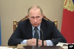 2015年5月27日俄罗斯总统普京在克里姆林宫说，美国干涉国际足联事务