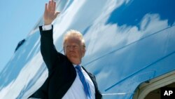 President Donald Trump boards Air Force One for a trip to Singapore to meet with North Korean leader Kim Jong Un,, June 9, 2018, at Canadian Forces Base Bagotville, in Saguenay, Quebec. 