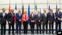 Các nhà lãnh đạo tham dự cuộc đàm phán hạt nhân Iran chụp ảnh lưu niệm tại Vienna, ngày 14/7/2015.