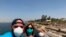 This photo provided by Javier Parodi, shows a selfie of Javier Parodi, left, Grissel Parodi and Amy Khamissian, on board the Nile cruise ship MS Asarade, in Luxor, Egypt, March 10, 2020.