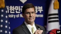 U.S. Defense Secretary Mark Esper attends a joint press conference with South Korean Defense Minister Jeong Kyeong-doo, after the 51st Security Consultative Meeting (SCM) at the Defense Ministry in Seoul Friday, Nov. 15, 2019. 