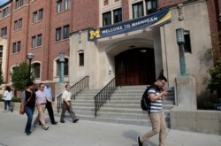 A "Welcome" banner is seen on a University of Michigan building in Ann Arbor, Michigan, Sept. 19, 2018.