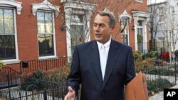 House Speaker-designate John Boehner of Ohio walks out of his home on Capitol Hill in Washington, 05 Jan 2011