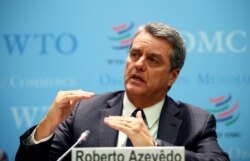 FILE - World Trade Organization Director-General Roberto Azevedo speaks at a news conference after a two-day General Council meeting at WTO headquarters in Geneva, Switzerland, Dec. 10, 2019.