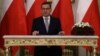 Poland's New Prime Minister Sworn In With Old Cabinet