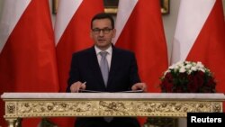Новопризначений прем’єр-міністр Матеуш Моравецький захищає дії урядової партії Право і справедливість