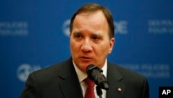 Swedish Prime Minister Stefan Lofven gives a press conference at the Organization for Economic Cooperation and Development headquarters, in Paris, Nov. 9, 2018.