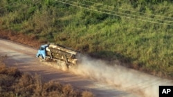 A truck carrying hardwood timber drives along a rural road leading to Paragominas, northern state of Para, Brazil (file photo)
