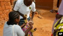 Cameroon launched a polio vaccination campaign for 6.2 million children this year. Volunteers (above) administered the vaccine in Nigeria in 2005.