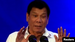 Philippine President Rodrigo Duterte delivers a speech during the 80th National Bureau of Investigation anniversary, Nov. 14, 2016. On Thursday Duterte said he might withdraw from the International Criminal Court. 