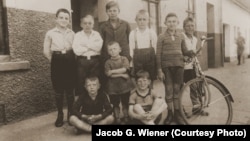 A 1929 photo shows neighborhood boys in Bremen, Germany. It's part of a special exhibit at the U.S. Holocaust Memorial Museum that inspired an art installation by Hungarian students studying anti-discrimination. (US Holocaust Memorial Museum, courtesy of Jacob G. Wiener)