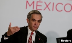 FILE - Mexico City's Mayor Miguel Angel Mancera speaks to the media in Mexico City, Mexico, Dec. 2, 2016.