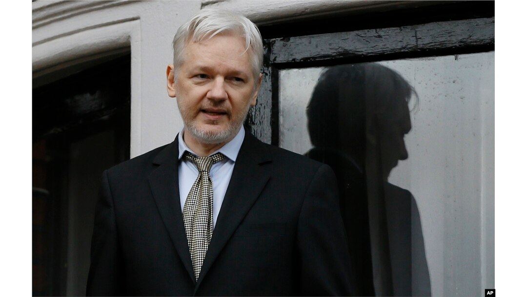 FILE - In this Feb. 5, 2016 file photo, WikiLeaks founder Julian Assange speaks from the balcony of the Ecuadorean Embassy in London.
