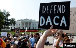 FILE - Demonstrators protest in front of the White House after the Trump administration rescinded the Deferred Action for Childhood Arrivals program, Sept. 5, 2017.