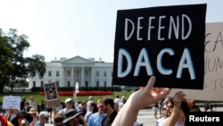 FILE - Demonstrators protest in front of the White House after the Trump administration scrapped the Deferred Action for Childhood Arrivals program, Sept. 5, 2017.