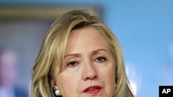 Secretary of State Hillary Clinton addresses the media during a joint news conference with Polish Foreign Minister Radoslaw Sikorski at the State Department in Washington, March 7, 2012