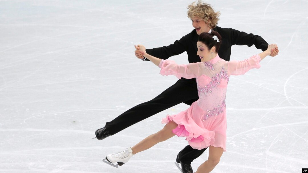 Meryl Davis dan Charlie White, atlet dansa berpasangan di atas es dari Amerika Serikat, saat beraksi di Iceberg Skating Palace, Olimpiade Musim Dingin 2014, di Sochi, Rusia (16/2).