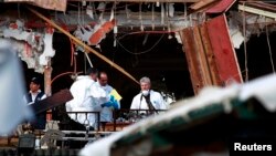 The scene of an explosion at a Marrakesh cafe, April 29, 2011, where a bomb killed 15 people in an attack by suspected Islamist militants. 