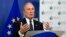 FILE - Michael Bloomberg, U.N. special envoy for cities and climate change, speaks to reporters at EU headquarters in Brussels about cities' cooperative efforts to combat climate change, June 22, 2016.