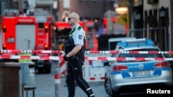 Policija na mestu napada u nemačkom gradu Minsteru, 7. april 2018.