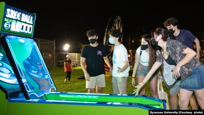 Syracuse students played games outdoors one night at an event called Orange Palooza earlier this school year.