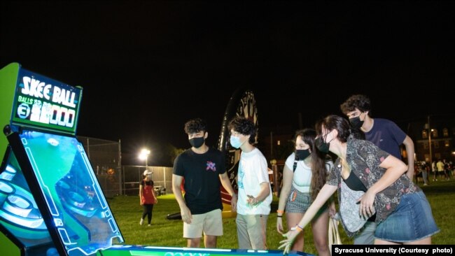 Syracuse students played games outdoors one night at an event called Orange Palooza earlier this school year.