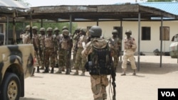 The Nigerian government has deployed thousands of soldiers, such as these in Borno State, to fight Boko Haram in the north, June 6, 2013. (Heather Murdock/VOA)