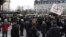 Counter-demonstrators gather to show their disapproval of a movement calling itself "The People's Demonstration", which held a meeting and demonstration at Norrmalmstorg square in Stockholm, Sweden, Jan.30, 2016. 