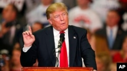 Republican presidential candidate Donald Trump speaks during a campaign rally in Madison, Miss., March 7, 2016.