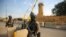 Iraqi counter-terrorism forces stand guard in front of the U.S. embassy in the capital Baghdad, Jan. 2, 2020.