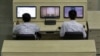 North Korean technicians man computer terminals at North Korea's space agency's General Launch Command Center on the outskirts of Pyongyang, April 11, 2012.