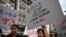 Protesters march near the Tin Hau MTR station in Hong Kong on August 18, 2019, in the latest opposition to a planned extradition law that has since morphed into a wider call for democratic rights in the semi-autonomous city. - Hong Kong democracy activist