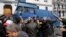 Police officers disperse people protesting after parliament appointed upper house chairman Abdelkader Bensalah as interim president following the resignation of Abdelaziz Bouteflika in Algiers, Algeria, April 9, 2019. 