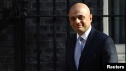 Britain's Home Secretary Sajid Javid arrives in Downing Street in London, May 1, 2018.