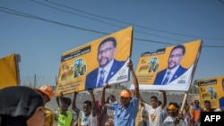 Supporters hold banners of candidates during a rally of the opposition Waddani Party for Somaliland’s elections in Hargeisa, the capital of the self-declared republic of Somaliland in northern Somalia, May 25, 2021.