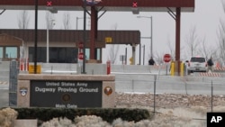 FILE - The main gate at Dugway Proving Ground military base.