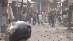 Protesters pelt stones at police personnel during clashes over citizenship law in Gorakhpur, Uttar Pradesh, India, Dec. 20, 2019, in this still image taken from video.
