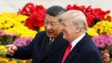 U.S. President Donald Trump and China's President Xi Jinping attend a welcoming ceremony in Beijing, Nov. 9, 2017. 