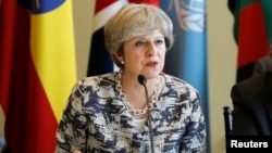 British Prime Minister Theresa May speaks during a meeting on the sidelines of the 72nd United Nations General Assembly at U.N. Headquarters in New York, Sept. 19, 2017.