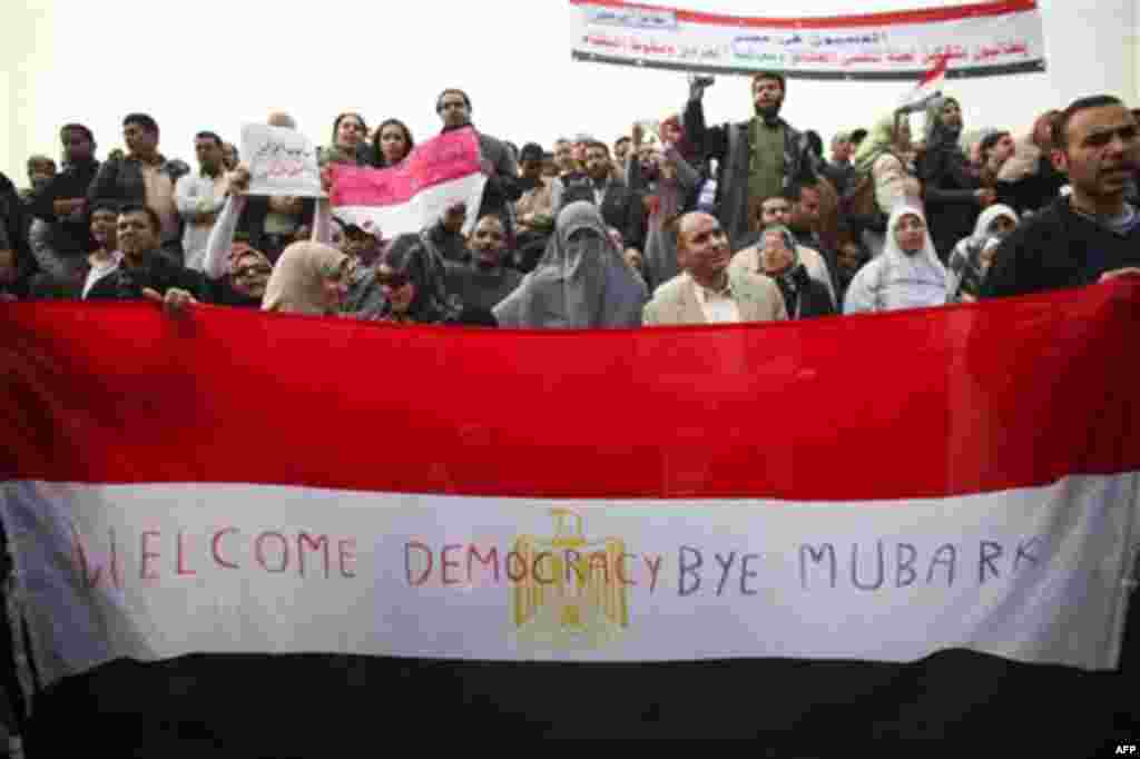 Anti-government protesters demonstrate in Tahrir, or Liberation Square in Cairo, Egypt, Tuesday, Feb. 1, 2011. More than a quarter-million people flooded into the heart of Cairo Tuesday, filling the city's main square in by far the largest demonstration i