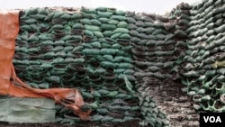 The stockpile of charcoal in Bur Gabo is estimated to be worth several millions dollars, Bur Gabo, Somalia, July 5, 2012. (Roopa Gogineni/VOA) 