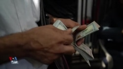 بڕیارێکی حکومەتی عێراق بۆ داگرتنی بەهای دینار نادڵنیایی لە بازاڕەکان دروست دەکات