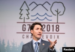 쥐스탱 트뤼도 캐나다 총리가 지난 8일 캐나다 퀘벡에서 열린 주요 7개국(G7) 정상회의 중 기자회견을 열고 있다.