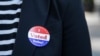 Lisa O. wears an "I Voted Today!" sticker after casting her vote during early voting at City Hall in Philadelphia, Pennsylvania on October 7, 2020. (Photo by GABRIELLA AUDI / AFP)