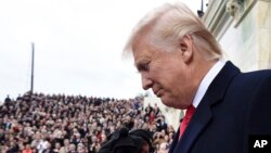 President-elect Donald Trump arrives for his presidential inauguration on Capitol Hill in Washington, Jan. 20, 2017.