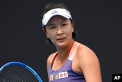 FILE - China's Peng Shuai reacts during her first round singles match against Japan's Nao Hibino at the Australian Open tennis championship in Melbourne, Australia on Jan. 21, 2020.