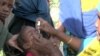 Child receives polio vaccine in Somalia. 